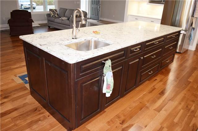 Stained rustic hickory island - Quartz countertop